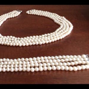 Four-strand pearl necklace with matching bracelet